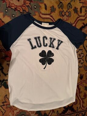 Lucky Brand adult White Tee with navy/black Raglan Sleeves and Clover Graphic